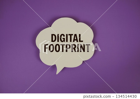Digital Footprint text with speech bubble on purple background 134514430