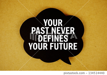 Your Past Never Defines Your Future text with speech bubble on paper craft background Your Past Never Defines Your Future text with speech bubble on paper craft background 134514440