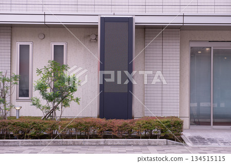 Large blank billboard on a street wall, banners with room to add your own text 134515115