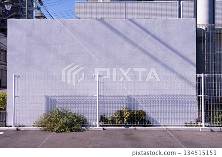 street wall background ,Industrial background, empty grunge urban street with warehouse brick wall street wall background ,Industrial background, empty grunge urban street with warehouse brick wall 134515151