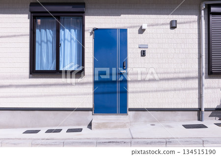 sidewalk by street wall  and  door 134515190
