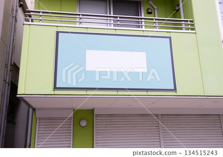 Large blank billboard on a street wall, banners with room to add your own text Large blank billboard on a street wall, banners with room to add your own text 134515243