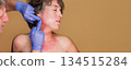 Doctor examining woman with eczema skin rash 134515284