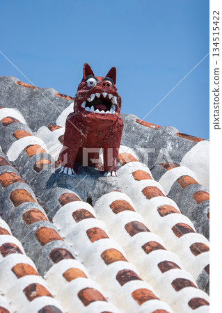 Taketomi Island - Shisa on a red tiled roof 134515422