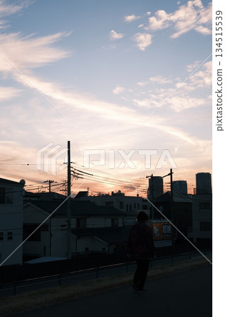 A nostalgic sky and streetscape with power lines at dusk A nostalgic sky and streetscape with power lines at dusk 134515539