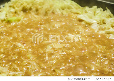 Monjayaki, a Japanese food for the common people, cooked on a teppanyaki grill, like okonomiyaki 134515846
