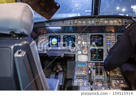 Inside the cockpit of a passenger plane Inside the cockpit of a passenger plane 134515914