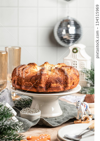 Chocolate marble bundt cake or zebra cake on festive christmas table, white kitchen xmas background Chocolate marble bundt cake or zebra cake on festive christmas table, white kitchen xmas background 134515969