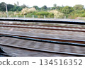Railway Tracks View from Moving Train Window 134516352