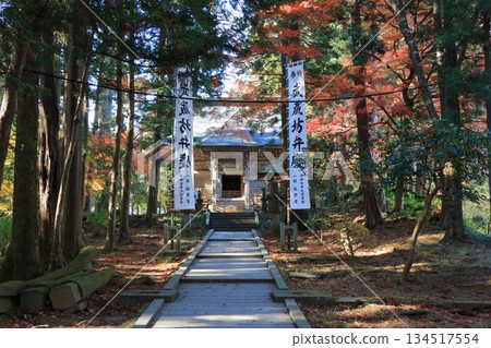 The wooded pathways in the Buddhist temple complex of Chusonji temple in Hiraizumi town of Iwate prefecture in Tohoku, Japan 134517554
