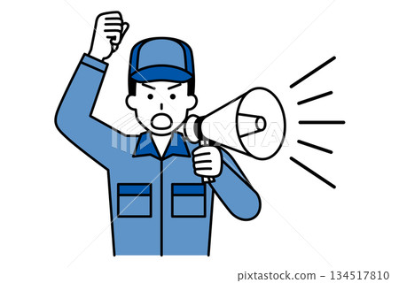 A man in overalls protesting with a loudspeaker 134517810