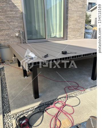 Artificial wood deck construction site 134518169