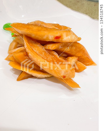 Chinese appetizer: Jiao Luo Bu Tiao (radish pickled in soy sauce) 134518745