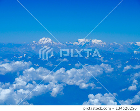 View of the Hindu Kush Mountains from an airplane flight between Dubai and Haneda 134520256