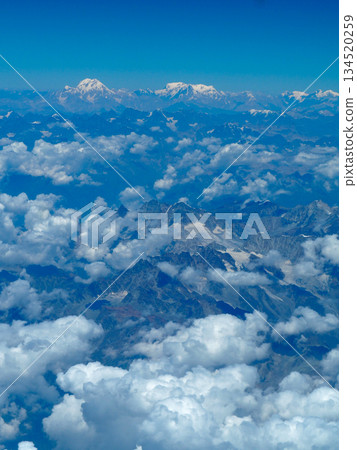 View of the Hindu Kush Mountains from an airplane flight between Dubai and Haneda View of the Hindu Kush Mountains from an airplane flight between Dubai and Haneda 134520259