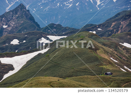 Yomogi Pass and Mt. Daigenta seen from the ridgeline of the Tanigawa Mountain Range and Mt. Takeno 134520579