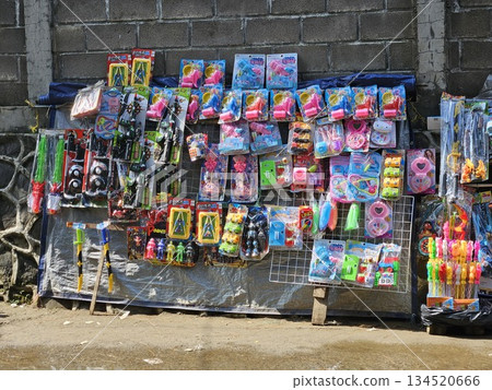This is toy shop on the street named Pedagang Kaki Lima 134520666