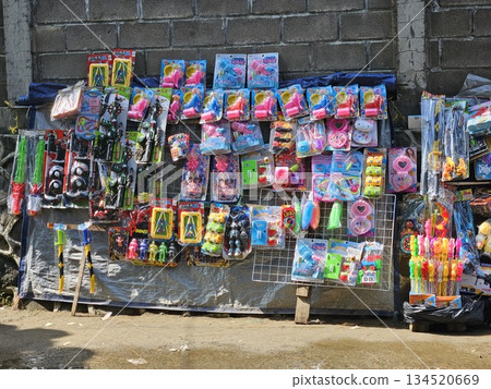 This is toy shop on the street named Pedagang Kaki Lima This is toy shop on the street named Pedagang Kaki Lima 134520669