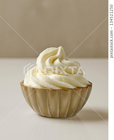 bowl of whipped cream 134521250