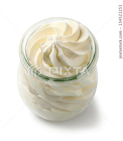 whipped cream in glass jar 134521251