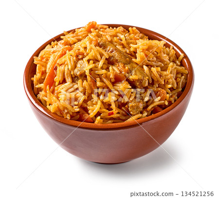 bowl of spicy rice with chicken meat and carrots 134521256