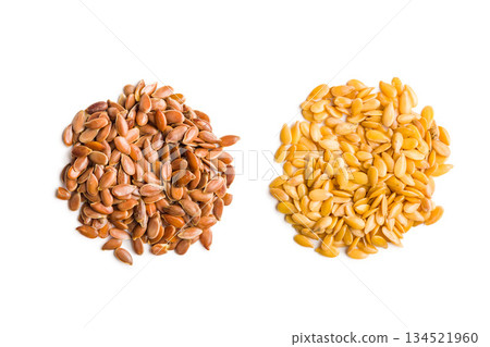 Golden and brown linseed or flaxseed. Healthy flax seed isolated on white background. 134521960