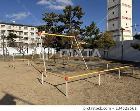 Children's swings installed in the park Children's swings installed in the park 134522561