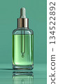 Natural serum bottle on green background 134522892