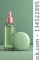 Natural serum bottle on green background 134522895