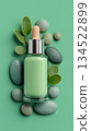 Natural serum bottle on green background 134522899
