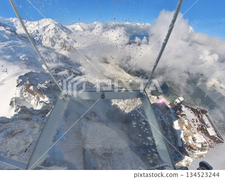 Aiguille du Midi glass observation deck with panoramic views of the Alps Aiguille du Midi glass observation deck with panoramic views of the Alps 134523244