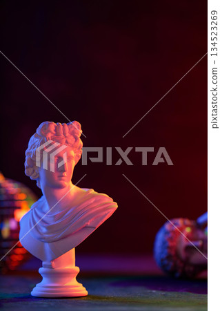 Classical Marble Bust Sculpture with Neon Purple Orange Lighting 134523269
