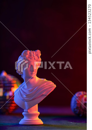 Classical Marble Bust Sculpture with Neon Purple Orange Lighting 134523270