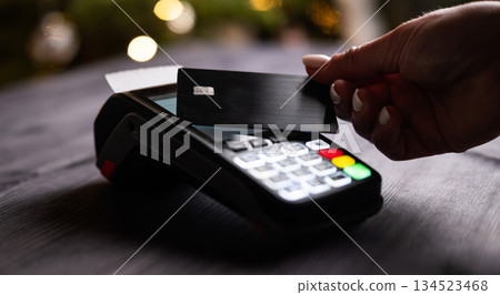 Girl Paying By Credit Card With Wireless Pos Terminal 134523468