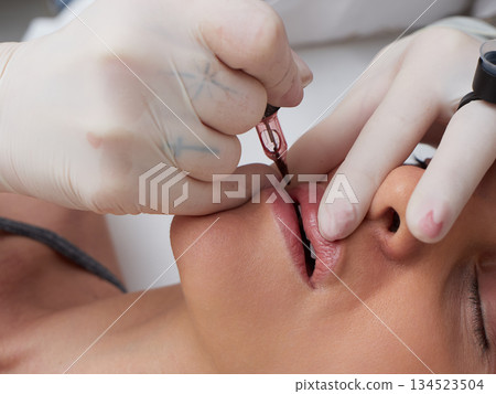 professional tattooist making permanent make up professional tattooist making permanent make up 134523504