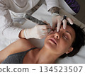professional tattooist making permanent make up 134523507