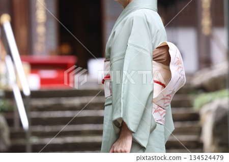 A woman in a kimono A woman in a kimono 134524479