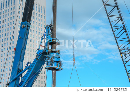 Earth drill for foundation work at construction site 134524785