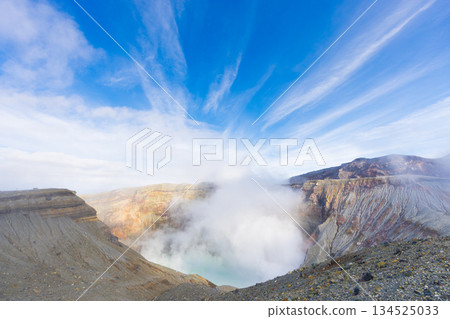 The quietly breathing Mount Aso, a landscape of clouds and craters The quietly breathing Mount Aso, a landscape of clouds and craters 134525033