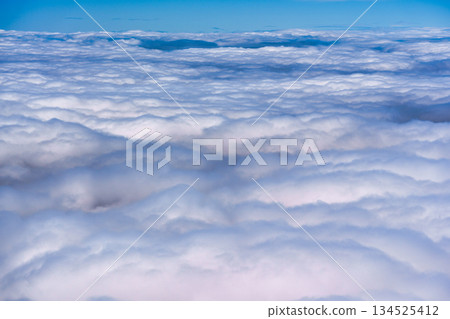 Scenic fluffy cloudscape soft texture, atmospheric pattern view Scenic fluffy cloudscape soft texture, atmospheric pattern view 134525412
