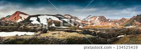 Scenic view of Landmannalaugar with volcanic mountain, black lava moss in Highlands of Iceland Scenic view of Landmannalaugar with volcanic mountain, black lava moss in Highlands of Iceland 134525419