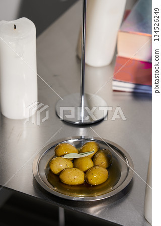 Warm Lighting With Cozy Olives, Comfortable Ambiance Showcasing Olives And Gentle Lighting Warm Lighting With Cozy Olives, Comfortable Ambiance Showcasing Olives And Gentle Lighting 134526249