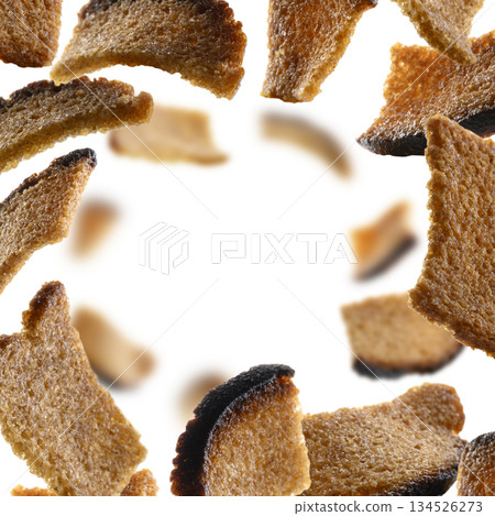 Rye croutons levitate on a white background Rye croutons levitate on a white background 134526273