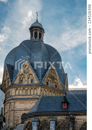 Aachen Cathedral dome and lantern rising into a soft winter sky 134526306