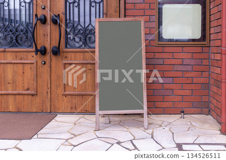 Large blank billboard on a street wall, banners with room to add your own text 134526511