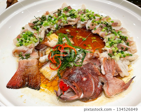 Chinese banquet dish: Peacock Opening Screen Steamed Stone Spot Fish (Chinese Steamed Grouper) Chinese banquet dish: Peacock Opening Screen Steamed Stone Spot Fish (Chinese Steamed Grouper) 134526849