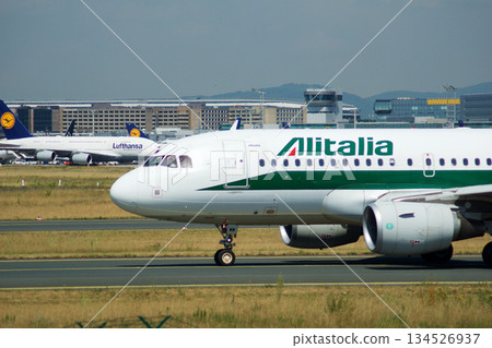 Frankfurt, Germany, July 09 2017: Italian Airbus A320 Taxiing Past Spotting Point Toward Runway 134526937