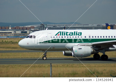Frankfurt, Germany, July 09 2017: Italian Airbus A320 Taxiing Past Spotting Point Toward Runway 134526941