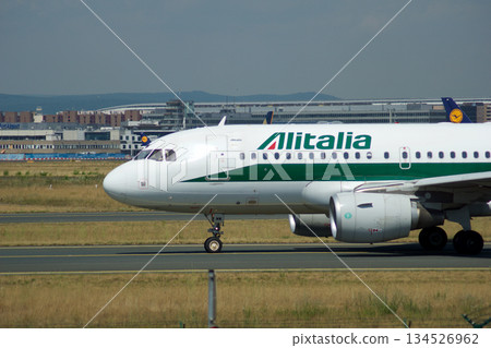 Frankfurt, Germany, July 09 2017: Italian Airbus A320 Taxiing Past Spotting Point Toward Runway 134526962