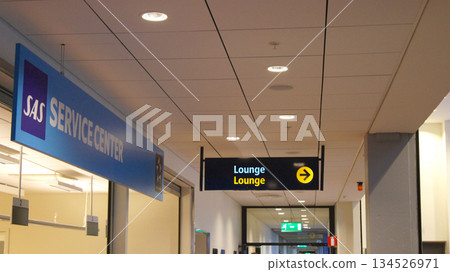 Stockholm, Sweden, December 10 2015: Sign Pointing to Frequent Flyer Lounge Stockholm, Sweden, December 10 2015: Sign Pointing to Frequent Flyer Lounge 134526971